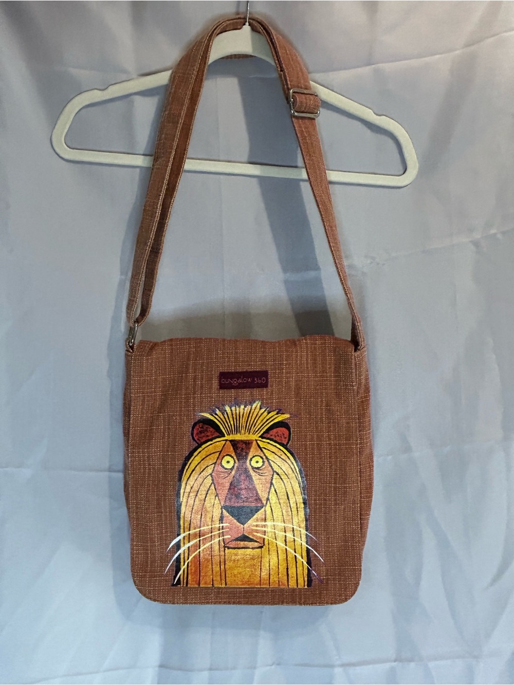 bungalow 360 Reddish Brown Crossbody Bag with Colorful Lion Artwork